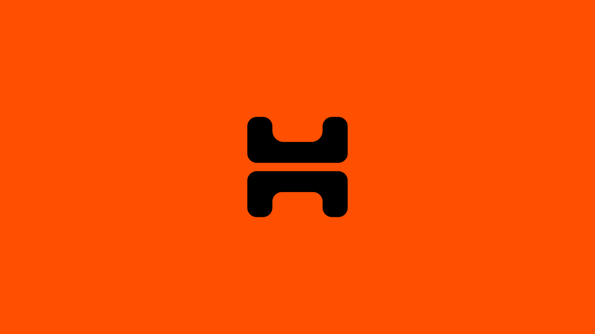 An orange background with the Unkayfabe logo, a "u" and an "n" stacked vertically, in black in the center.